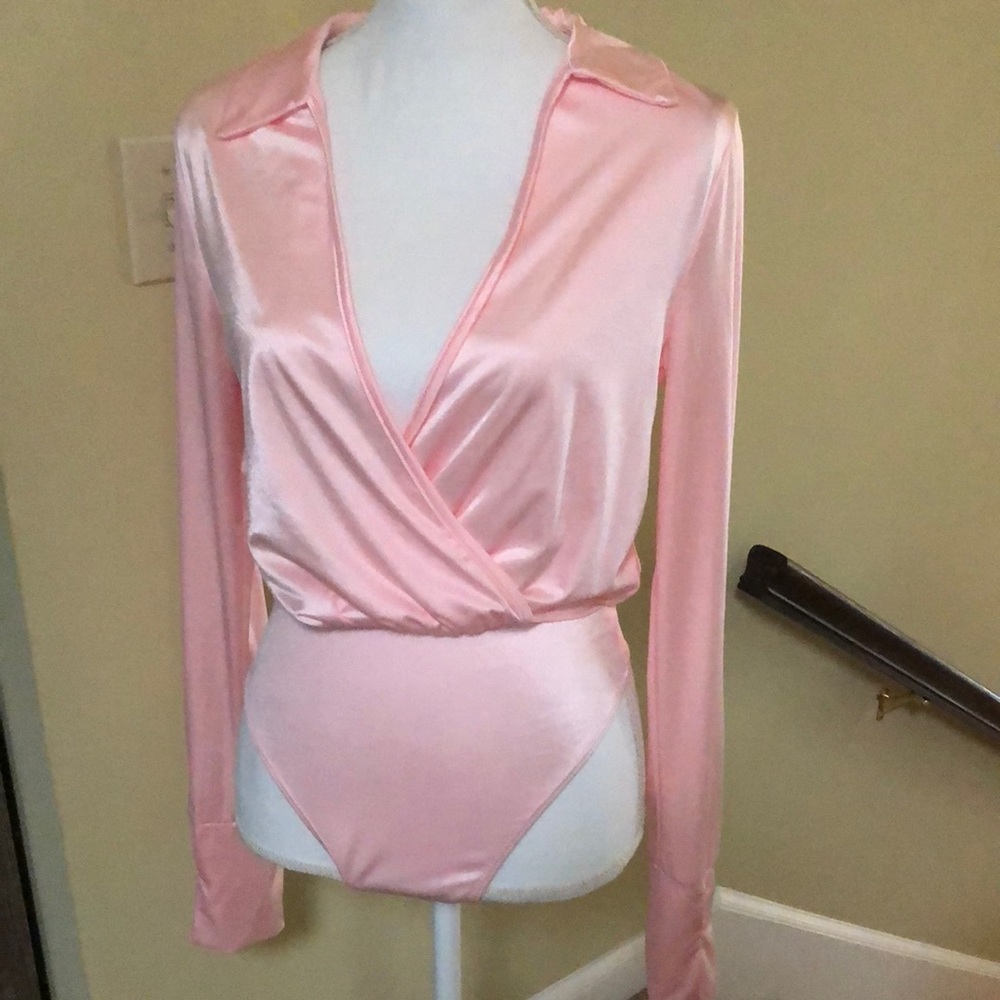 MM pink body suit size Large.